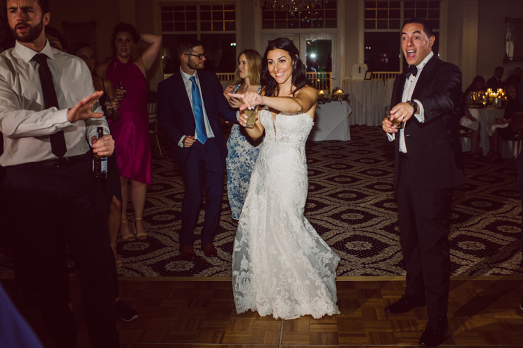 Brianna and Joe perfectly balances each other with their opposite personalities. Brianna quiet and calm and Joe loud and funny, they are the yin and yang to each other and together they create amazing chemistry. Joe's eyes literally sparkles when he is looking at her. Brianna and Joe's summer wedding at Trump National Golf Club Colts Neck NJ this past August was nothing but fun, filled with love and happy tears. Love is all we need in a wedding day! Brianna and Joe got married at ST. Mary’s Church in Colts Neck NJ then partied at Trump National Golf Club Colts Neck NJ. As soon as everyone was inside for the reception, the heavy grey clouds released a down pour washing the humidity away. Leaving cool evening for the newlyweds and their wedding guests to enjoy. Brianna and Joe's wedding at Trump National Golf Club Colts Neck NJ photographed by Karis, NY NJ wedding and elopement photographer Hey Karis.
